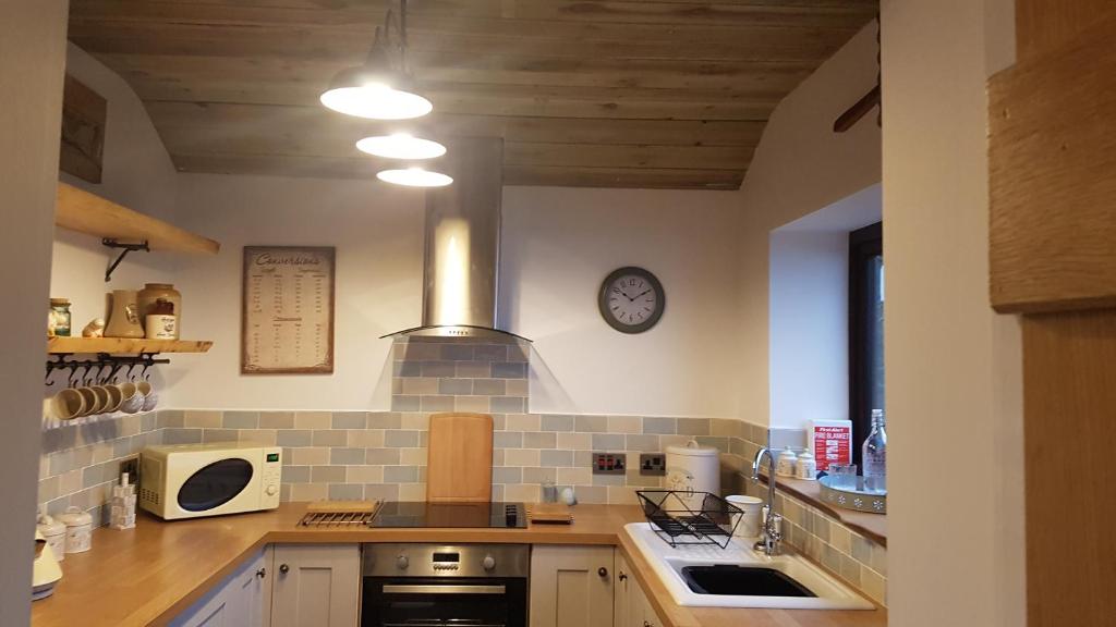 Kuchyň nebo kuchyňský kout v ubytování Riverside