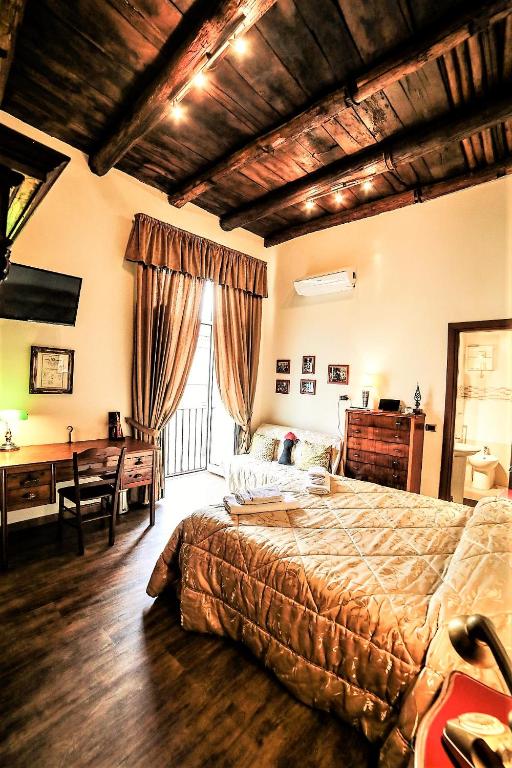 Posteľ alebo postele v izbe v ubytovaní San Gennaro B&B
