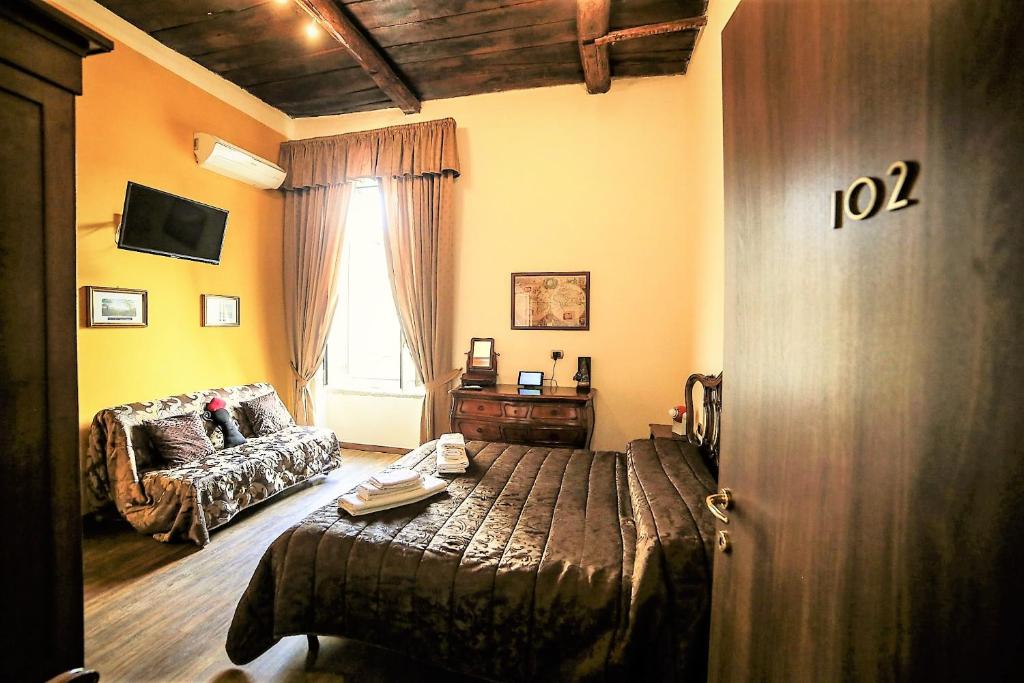 Televízia a/alebo spoločenská miestnosť v ubytovaní San Gennaro B&B