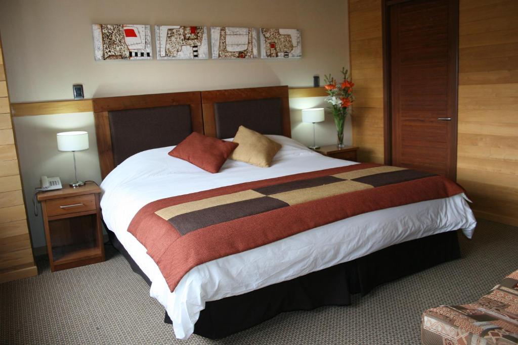Postel nebo postele na pokoji v ubytování Puerto Chico Hotel