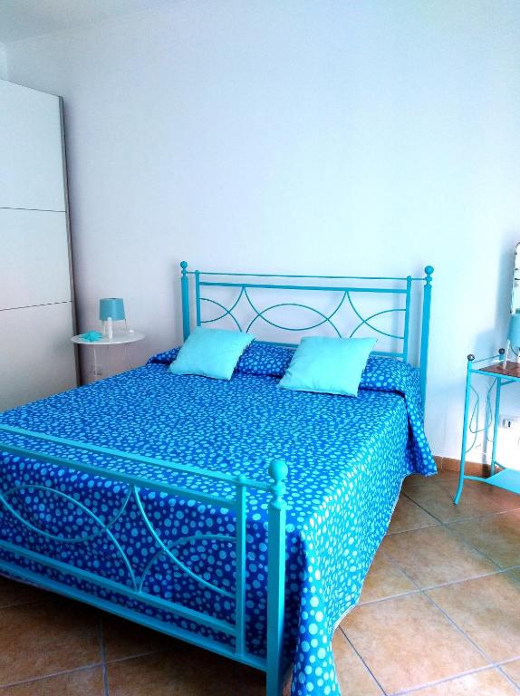 Postel nebo postele na pokoji v ubytování B&B Pizzomunno