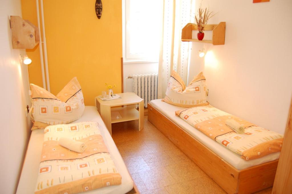 Postel nebo postele na pokoji v ubytování Penzion Eliska