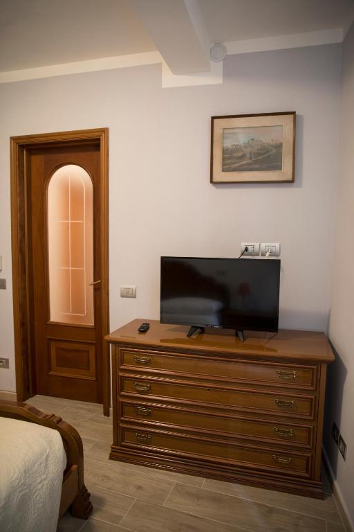 TV a/nebo společenská místnost v ubytování Le camere di Gio