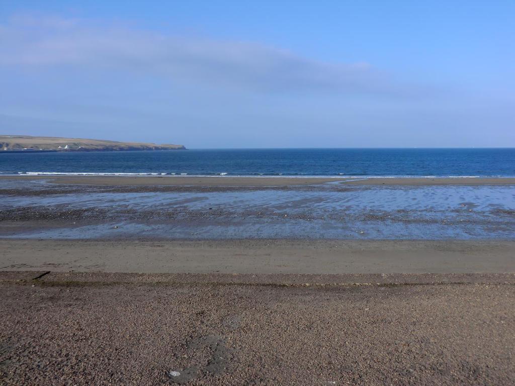 サーソーにあるThe Beach Houseの海を背景に広がる砂浜