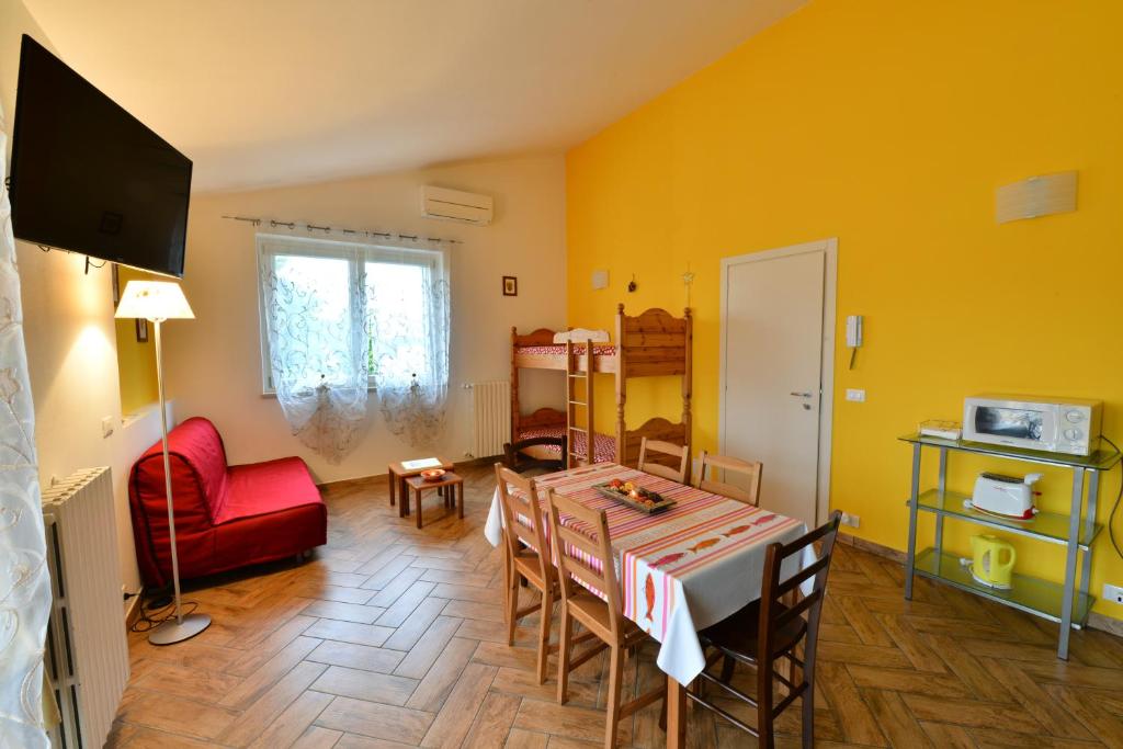 A kitchen or kitchenette at Le Palme Sona