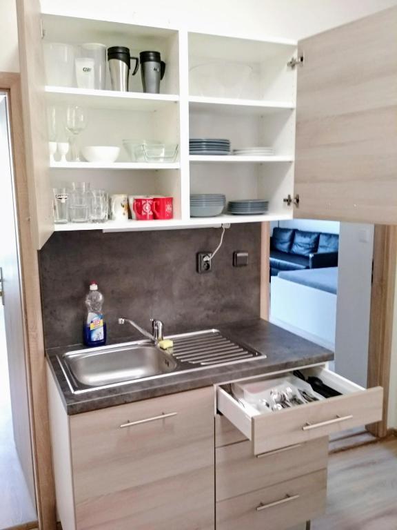 Kuchyň nebo kuchyňský kout v ubytování Central Accommodation Angel