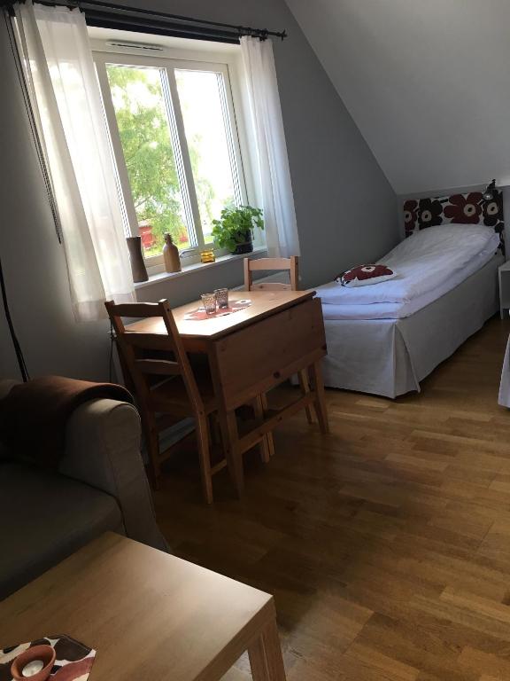 Postel nebo postele na pokoji v ubytování Ljungs Fem Rum