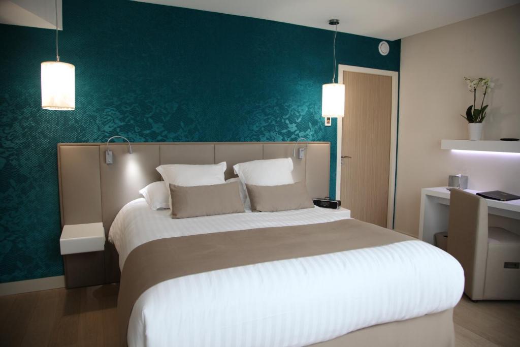 Postel nebo postele na pokoji v ubytování Best Western Premier Why Hotel