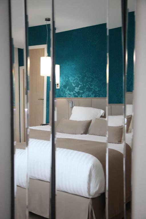 Postel nebo postele na pokoji v ubytování Best Western Premier Why Hotel