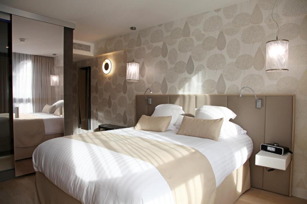 Postel nebo postele na pokoji v ubytování Best Western Premier Why Hotel