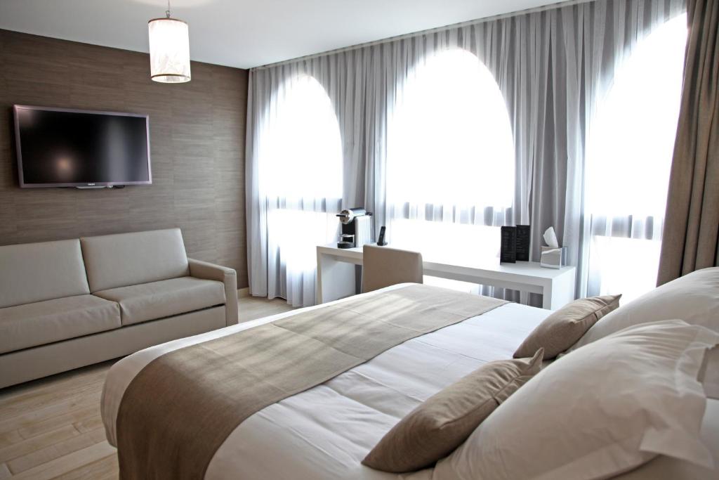 Postel nebo postele na pokoji v ubytování Best Western Premier Why Hotel