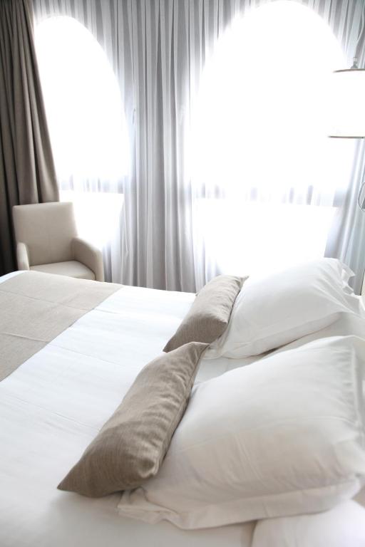 Postel nebo postele na pokoji v ubytování Best Western Premier Why Hotel