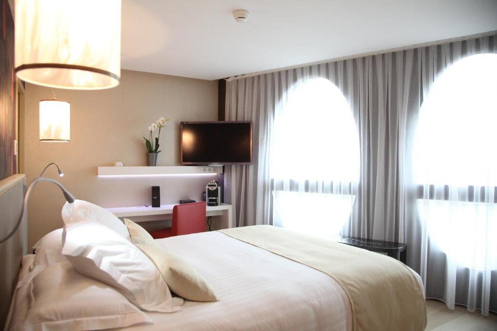 Postel nebo postele na pokoji v ubytování Best Western Premier Why Hotel