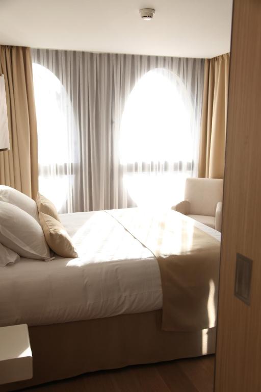 Postel nebo postele na pokoji v ubytování Best Western Premier Why Hotel