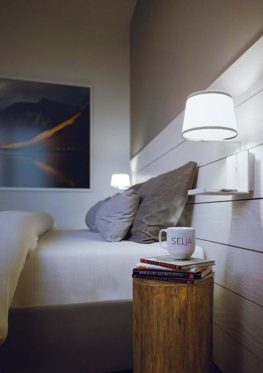 Postel nebo postele na pokoji v ubytování Hotel Selja