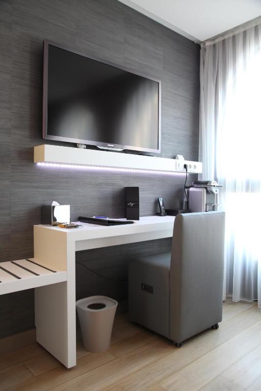 TV a/nebo společenská místnost v ubytování Best Western Premier Why Hotel