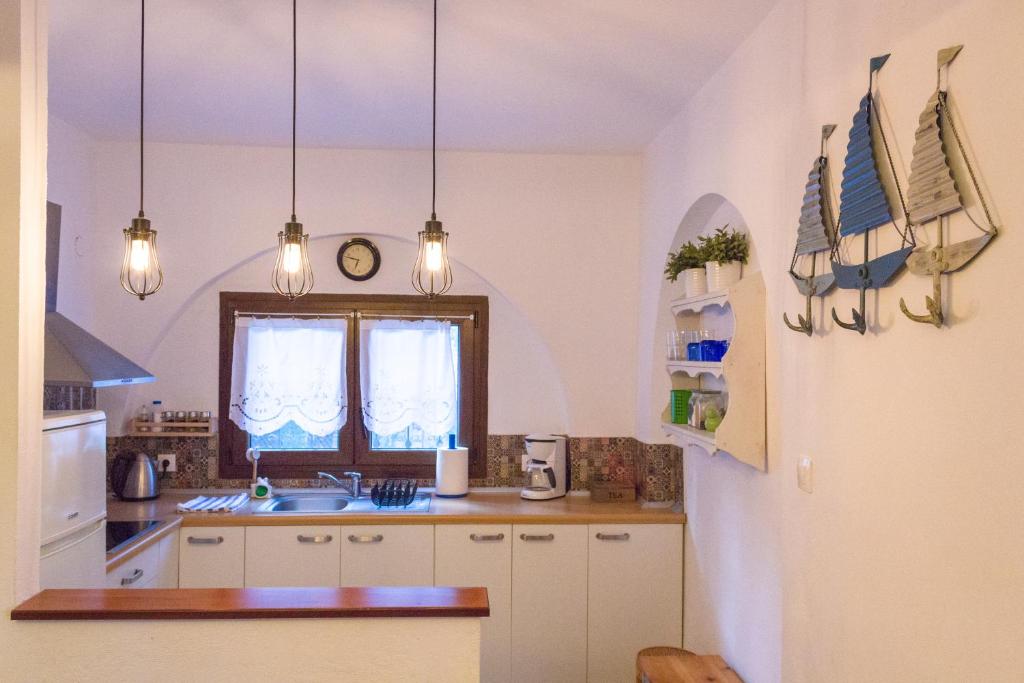 Kuchyň nebo kuchyňský kout v ubytování VillaVie