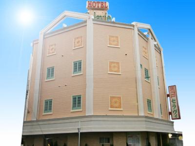 a large building with a tower on top of it at Hotel Celavie Osakajokitazume (Adult only) in Osaka