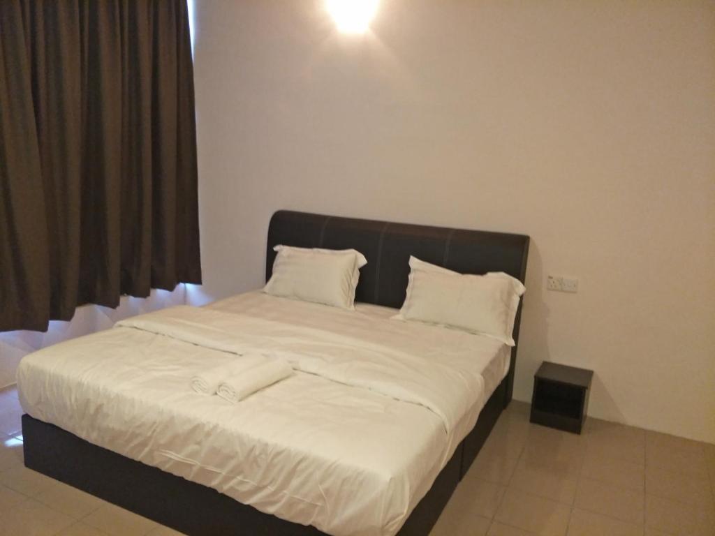 Postel nebo postele na pokoji v ubytování Anderson Hotel