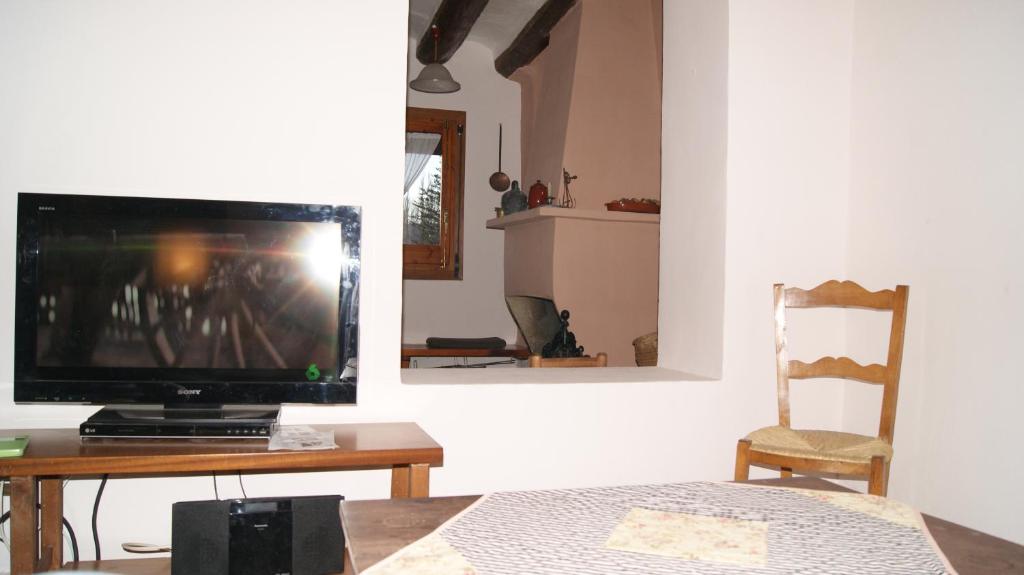 TV a/nebo společenská místnost v ubytování Casa Cardelina