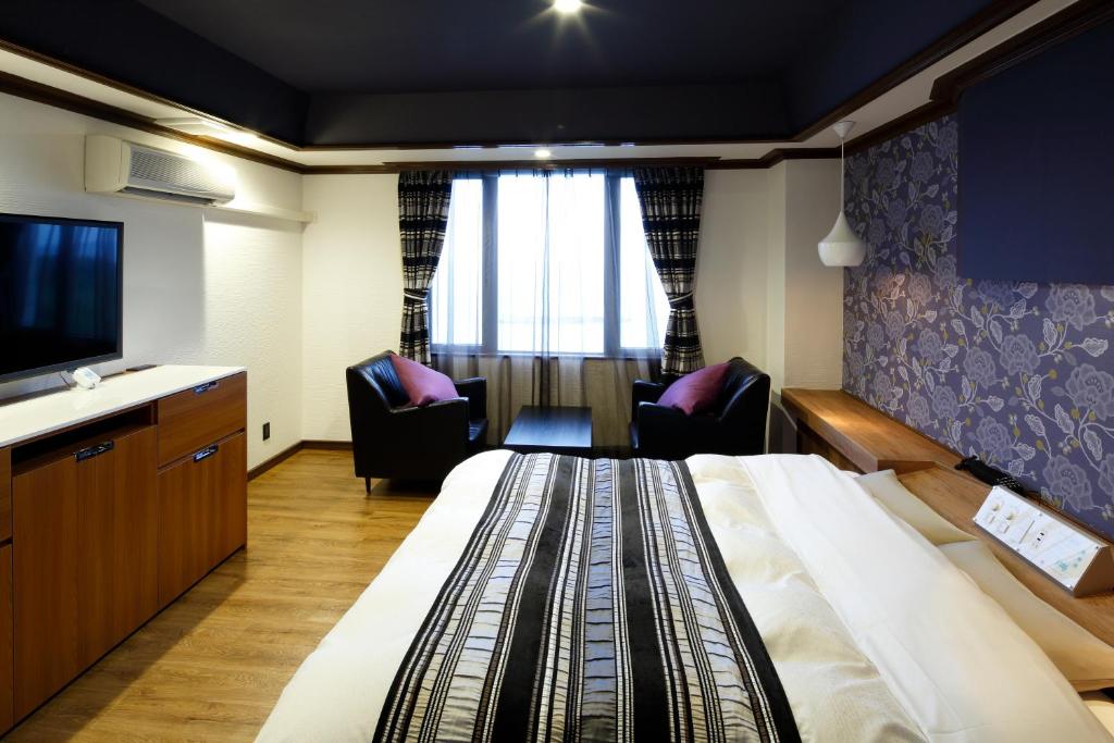 TV a/nebo společenská místnost v ubytování Hotel Sunset (Adult Only)