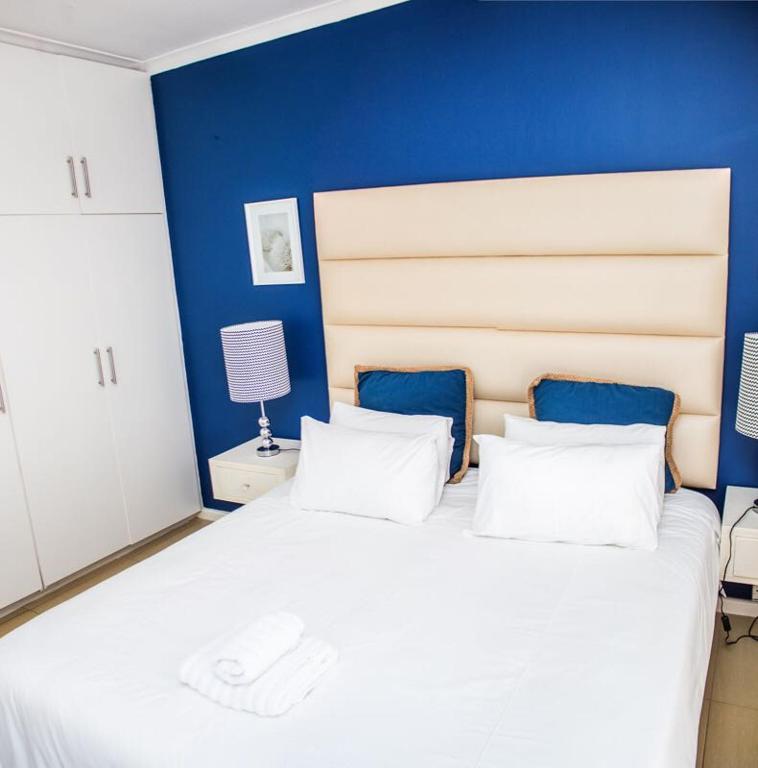 Postel nebo postele na pokoji v ubytování Mulenvo Guest House