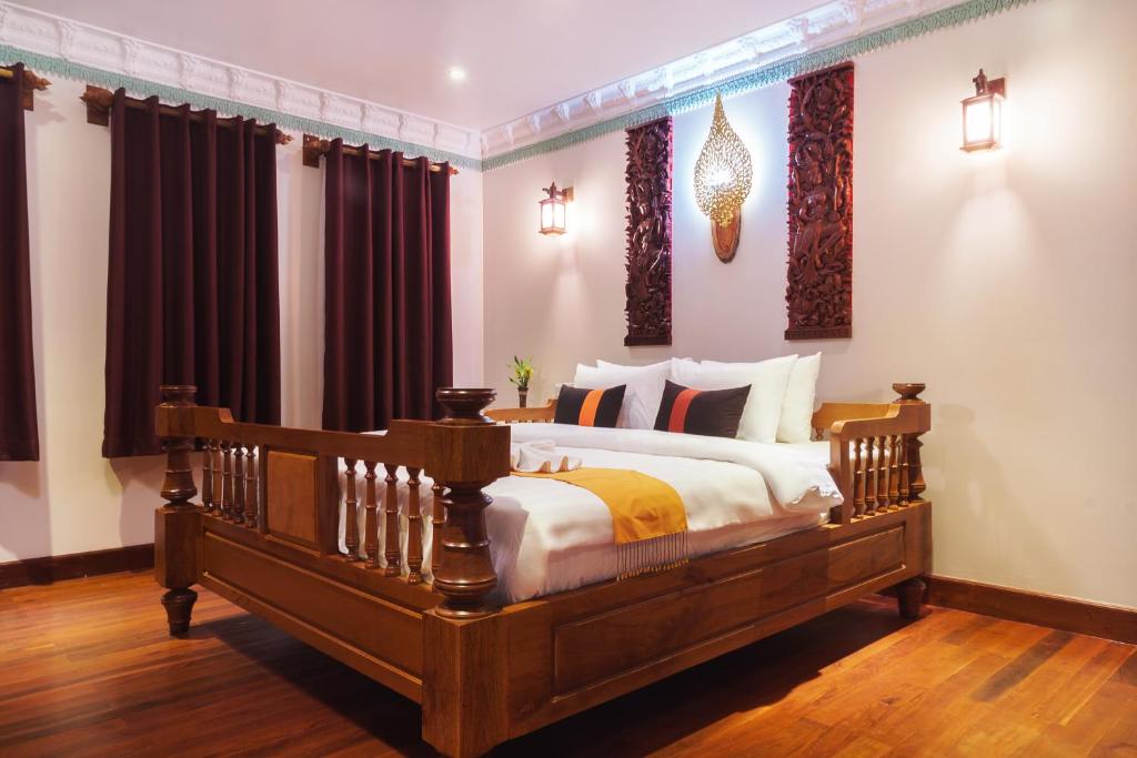 Postel nebo postele na pokoji v ubytování Hello Cambodia Boutique
