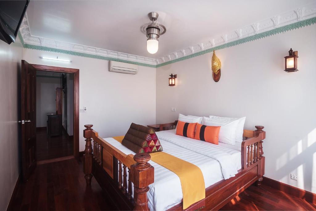 Postel nebo postele na pokoji v ubytování Hello Cambodia Boutique