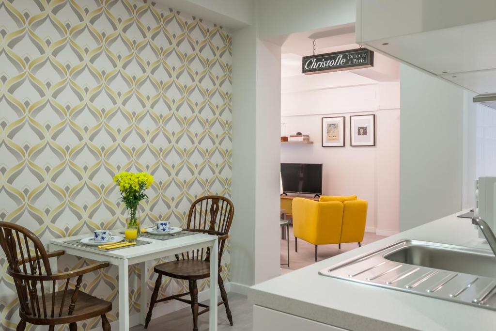TV a/nebo společenská místnost v ubytování Atelier Plaza Nueva Plus