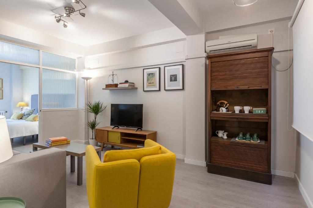 TV a/nebo společenská místnost v ubytování Atelier Plaza Nueva Plus
