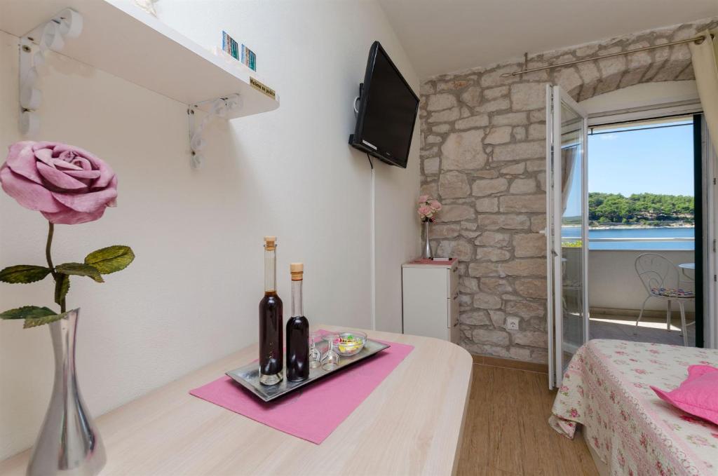 TV a/nebo společenská místnost v ubytování Apartments Djurdjica