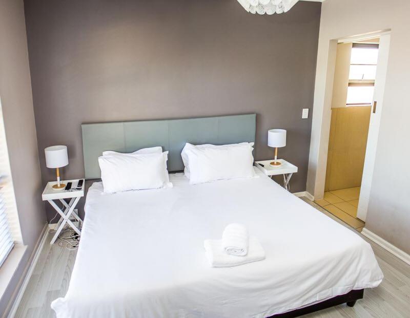 Postel nebo postele na pokoji v ubytování Mulenvo Guest House