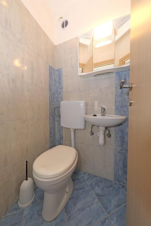 Kúpeľňa v ubytovaní Apartments Andelo II