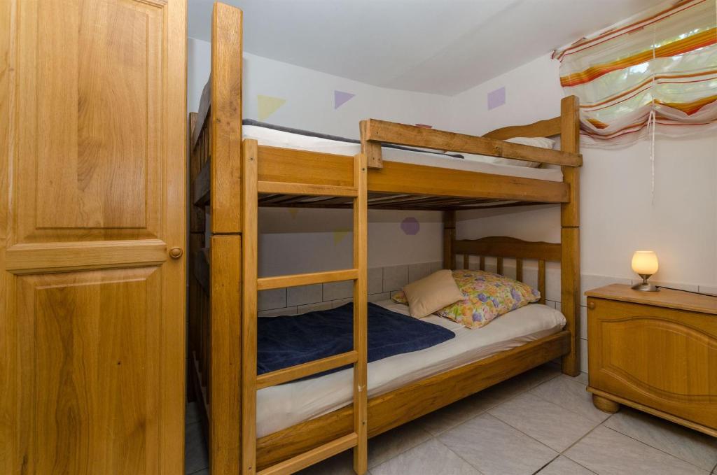 Posteľ alebo postele v izbe v ubytovaní Apartments Ljubica