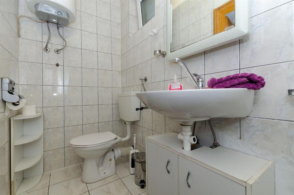 Kúpeľňa v ubytovaní Apartments Ljubica