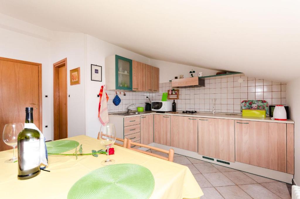 Kuchyň nebo kuchyňský kout v ubytování Apartments Milan