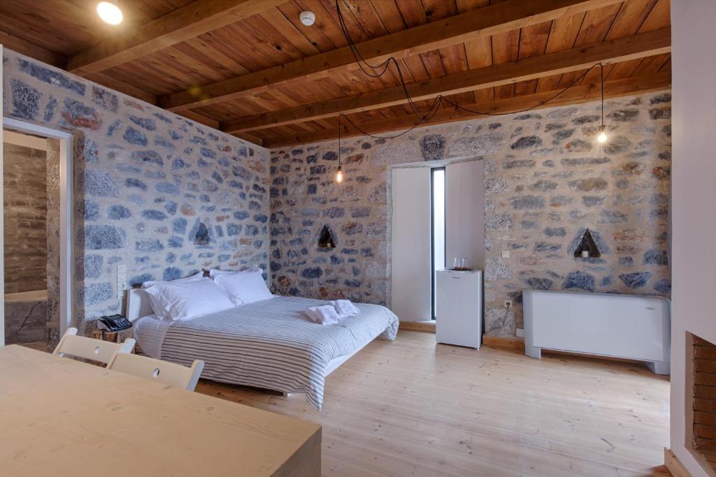 Postel nebo postele na pokoji v ubytování Aegila Boutique Hotel