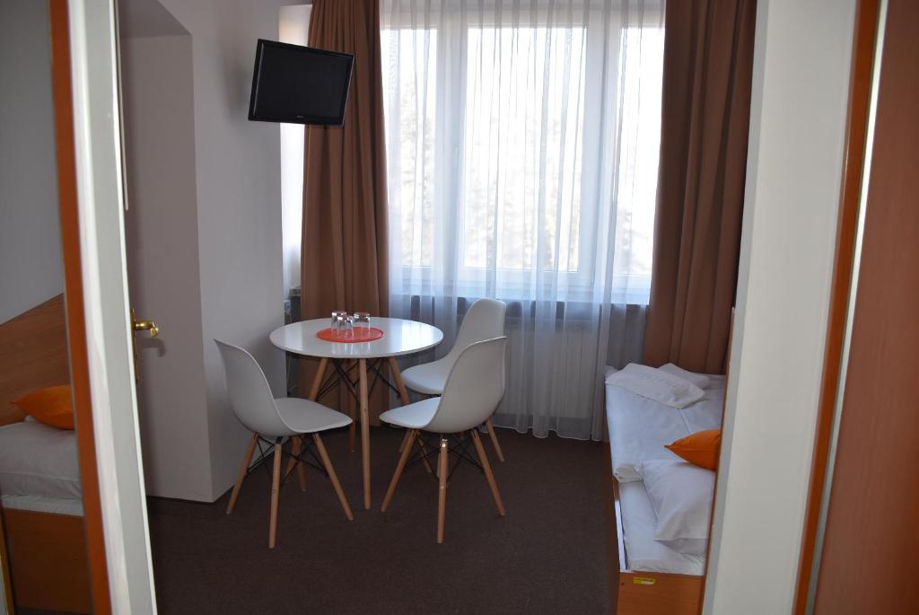 Posteľ alebo postele v izbe v ubytovaní Hotel PZMot
