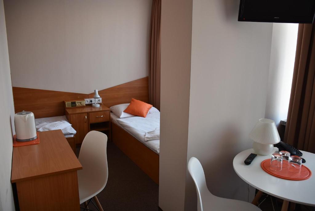 Posteľ alebo postele v izbe v ubytovaní Hotel PZMot