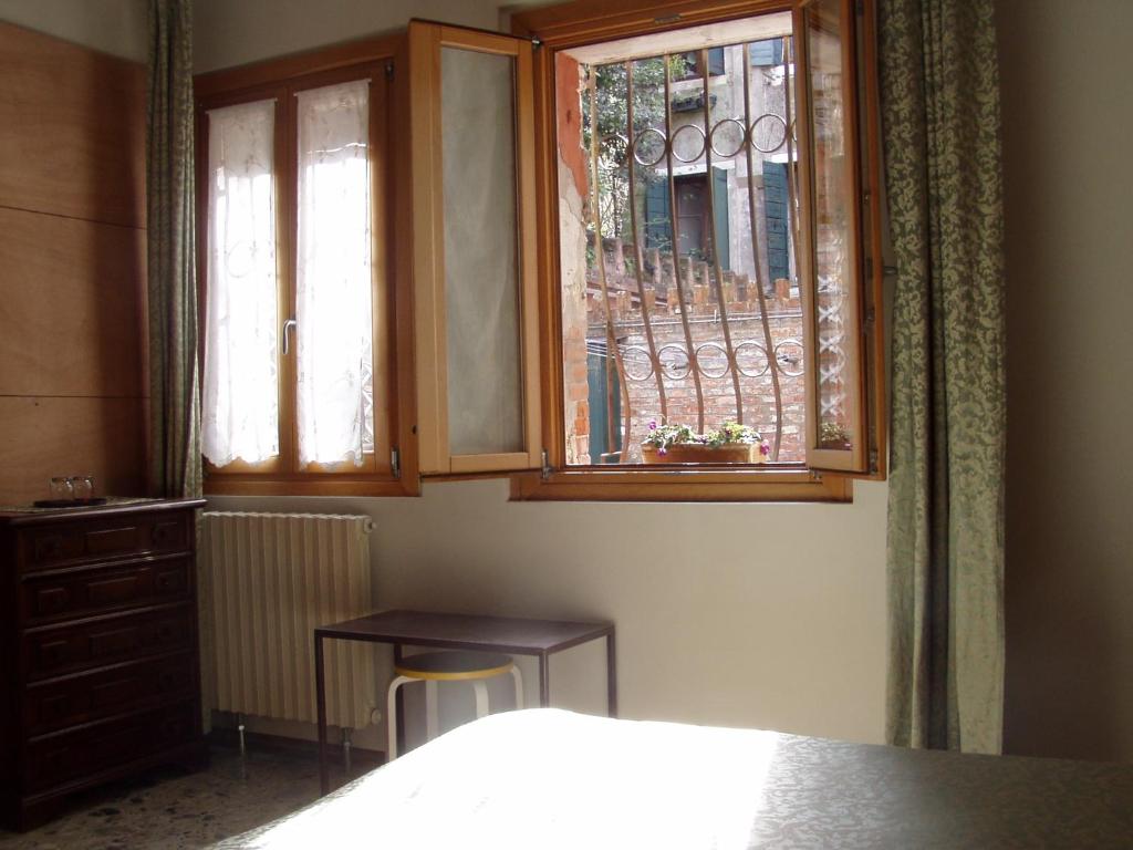 Posteľ alebo postele v izbe v ubytovaní b&b allo squero