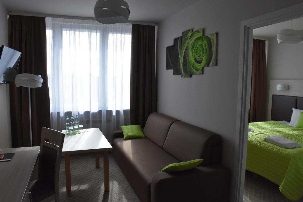 Posteľ alebo postele v izbe v ubytovaní Hotel PZMot