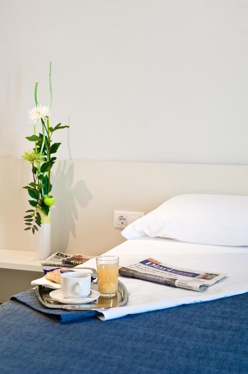 Postel nebo postele na pokoji v ubytování Hostal La Creu