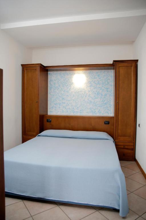 Postel nebo postele na pokoji v ubytování Residence Antico Crotto