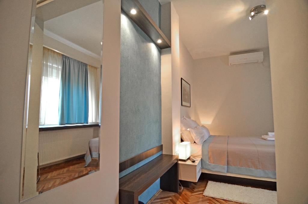 Postel nebo postele na pokoji v ubytování Garni hotel King