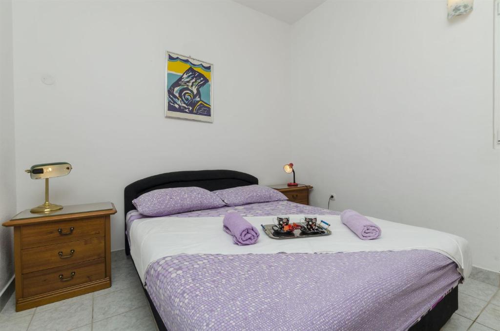 Posteľ alebo postele v izbe v ubytovaní Apartments Jasna