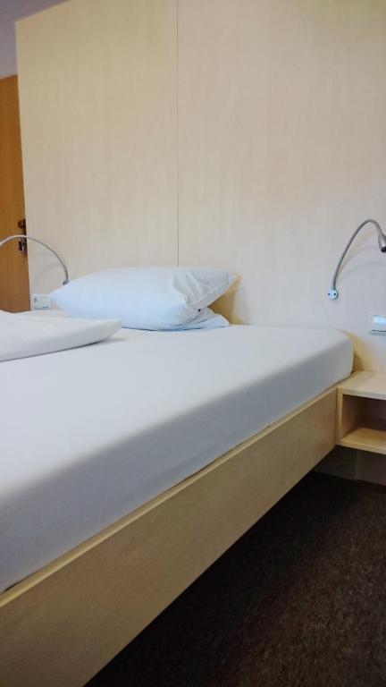 Postel nebo postele na pokoji v ubytování Gästehaus Langhammer