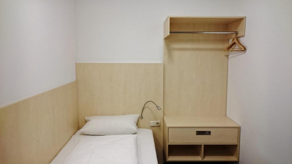 Postel nebo postele na pokoji v ubytování Gästehaus Langhammer
