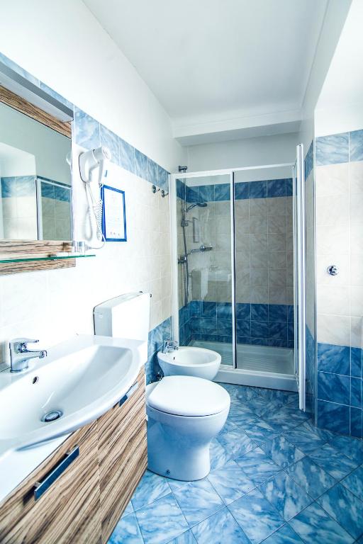 Koupelna v ubytování Hotel Centro