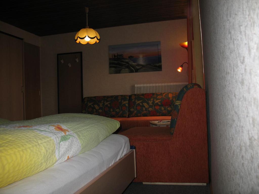 Postel nebo postele na pokoji v ubytování Gästehaus Luxner