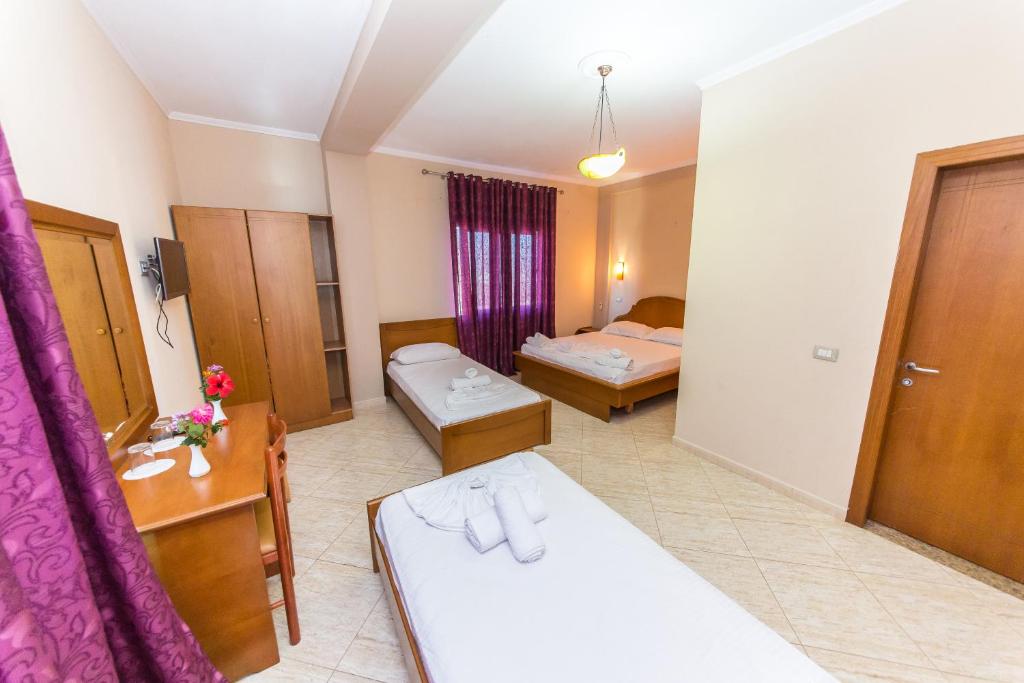 Postel nebo postele na pokoji v ubytování Hotel Bahamas
